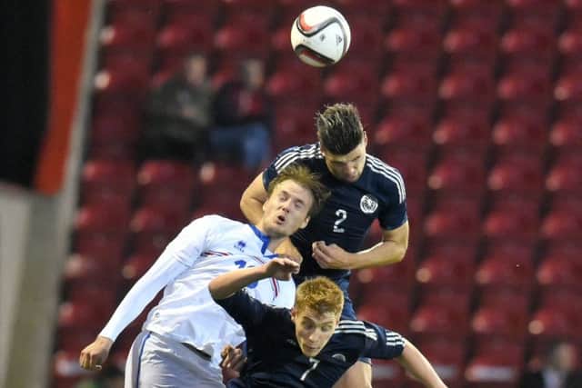 Scotland's Callum Paterson, Iceland's Aron Elis Brandarson and Jay Fulton battle for possession. Picture: SNS