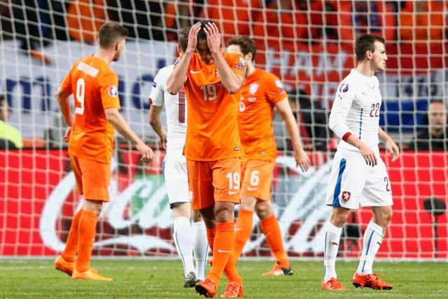 Agony for Robin van Persie of the Netherlands who scored at both ends during the defeat by the Czech Republic in Amsterdam. Picture: Getty