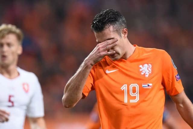Robin van Persie:  Will be staying at home next summer. Picture: Getty
