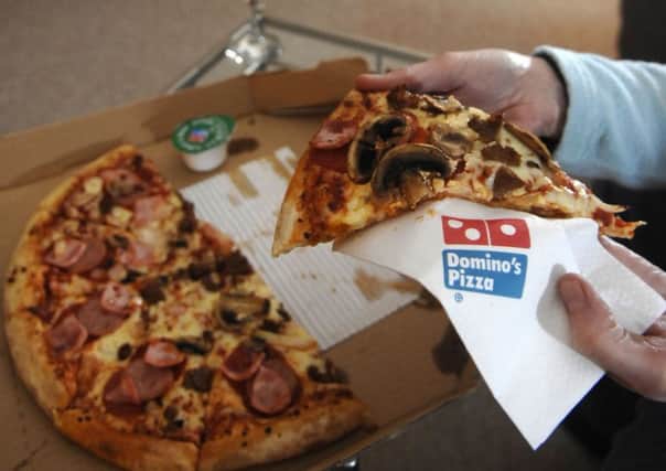 Domino's said popularity of its app helped online orders rise 35 per cent. Picture: Jane Barlow