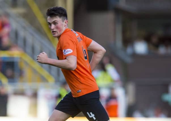 So far, midfielder John Souttar has resisted the offer of a new contract which would make him the joint highest earner at Dundee United. Picture: SNS