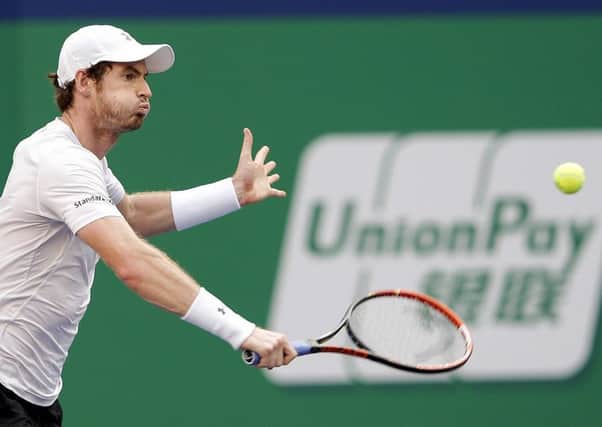Andy Murray beat American John Isner in Shanghai to clinch a quarter-final spot. Picture: Getty
