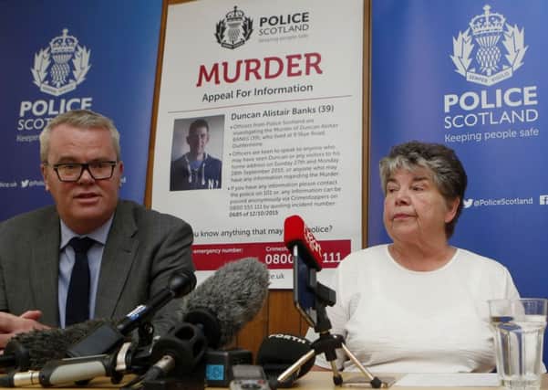 Detective Chief Inspector Keith Hardie and Dorothy Banks, mother of murder victim Duncan Banks, appeal for information. Picture: PA