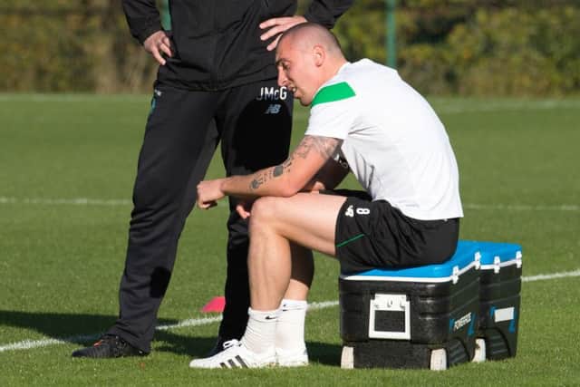 Scott Brown rolled on his ankle at training. Picture: SNS