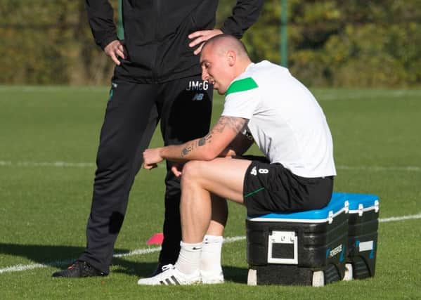 Scott Brown rolled on his ankle at training. Picture: SNS