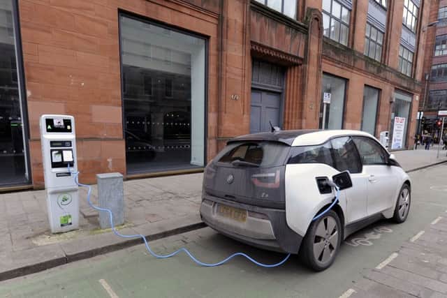 Electric car charging sites have already been trialed in Glasgow. Picture: John Devlin