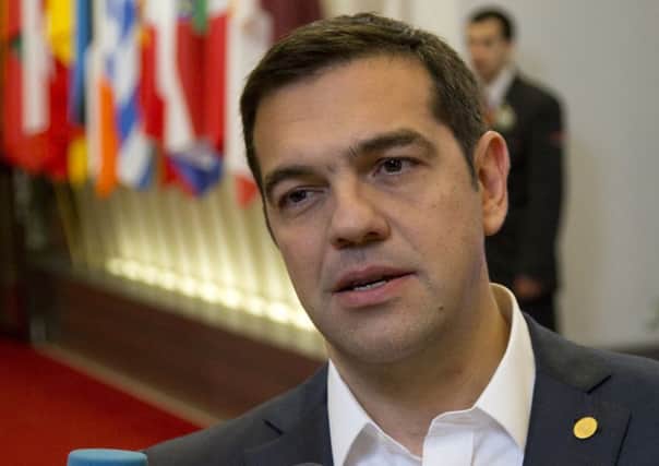 Greek prime minister Alexis Tsipras leaves an EU summit in Brussels yesterday. Picture: AP