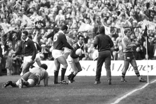 Keith Robertson scores a try during the Scotlands 32-13 defeat by Australia at Murrayfield in November 1988. Picture: Jack Crombie