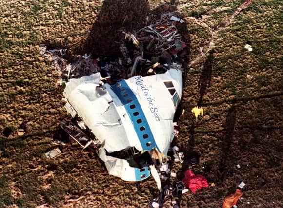The nose section of Pan Am Flight 103 lies in a field outside Lockerbie. Picture: AP