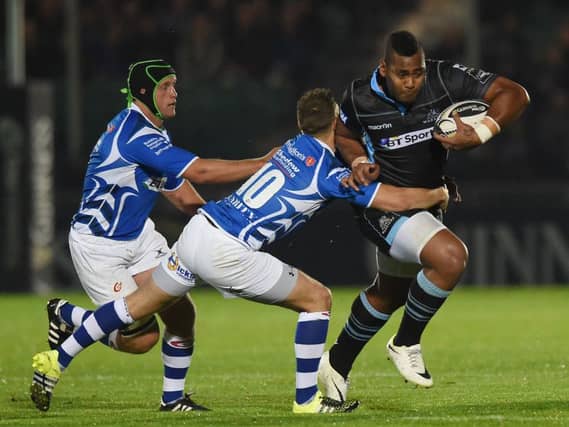 Glasgow wing Taqele Naiyaravoro (right) breaks through. Picture: SNS