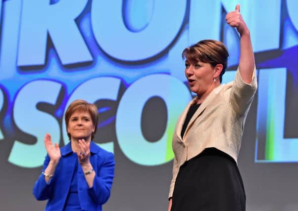 Leanne Wood, the Plaid Cymru leader acknowledges applause from Nicola Sturgeon following her address during the SNP conference. Picture: Getty