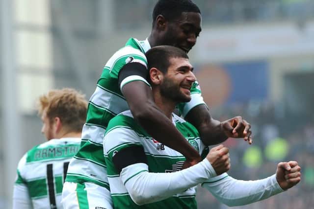 Nadir Ciftci of Celtic celebrates scoring with Tyler Blackett. Picture: Getty