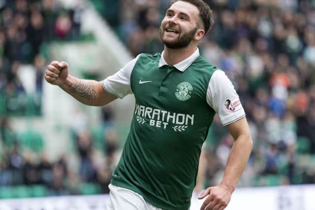 Hibernian's James Keatings celebrates having scored his side's fourth of the match. Picture: SNS