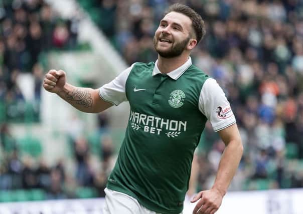 Hibernian's James Keatings celebrates having scored his side's fourth of the match. Picture: SNS