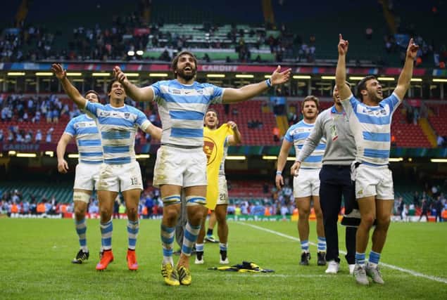 Argentine players celebrate reaching the semi-finals yesterday. Picture: Getty