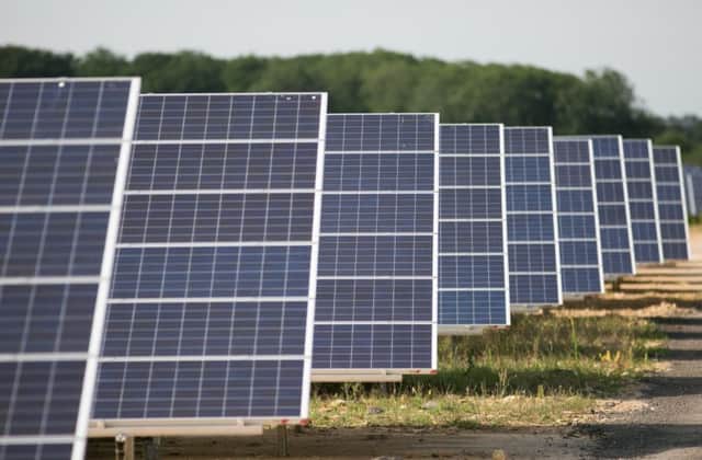 Solar panels are costly to develop but their energy source  the Sun  is free. Picture: PA