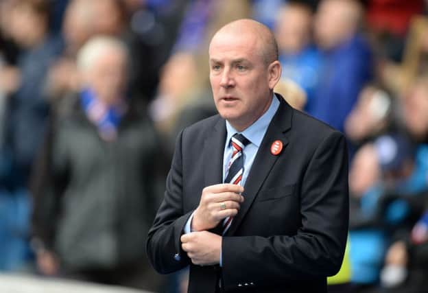 Mark Warburton watched on as Rangers came from behind to defeat Queen of the South on Saturday. Picture: SNS