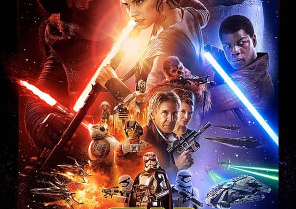 The theatrical poster for the new Star Wars film, The Force Awakens. Picture: PA