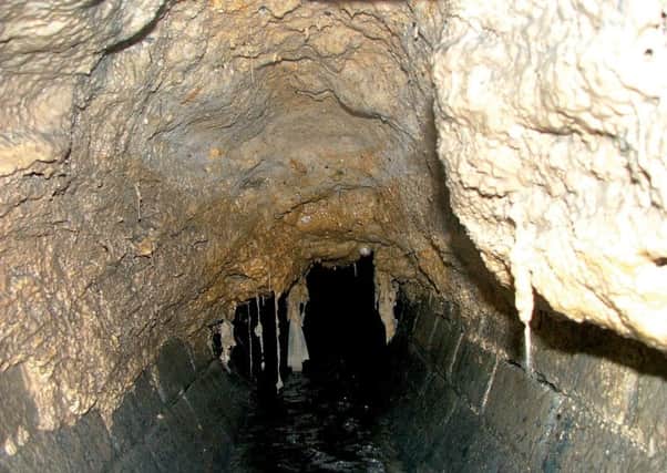 Solidified fat in a sewer - but no sign of false teeth or golf balls. Picture: Contributed