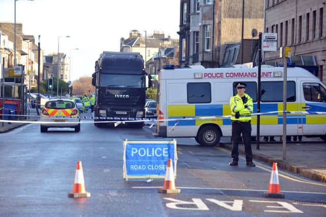 Police in the capital are often taken off the streets to help cover large events. Picture: Jon Savage