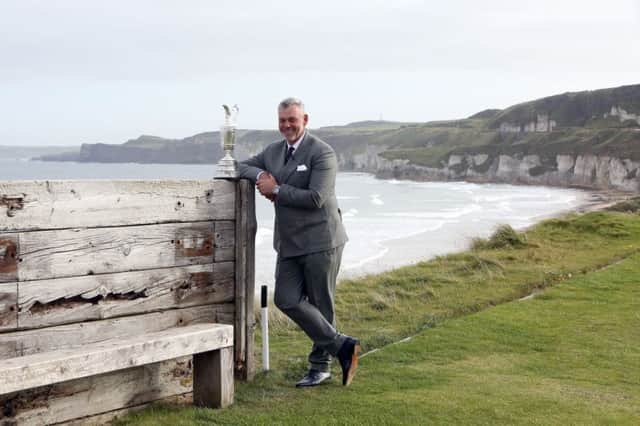 Darren Clarke poses with the Claret Jug at Royal Portrush. Picture: PA