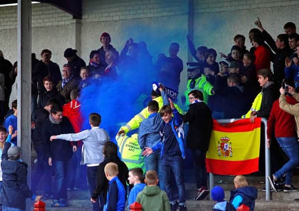 Derby day fans warned after flares and punches were thrown. Picture: Johnston Press