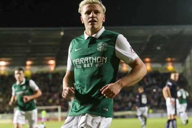 Jason Cummings celebrates after converting from the penalty spot. Picture: SNS