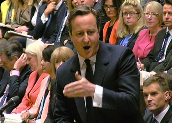 David Cameron was attacked over tax credit cuts. Picture: PA