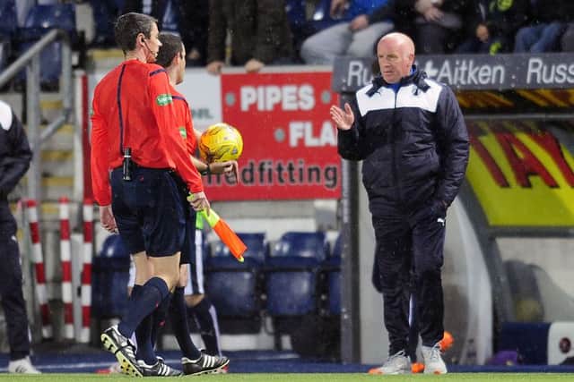 Peter Houston confronts referee Alan Muir after last night's game. Picture: Michael Gillen