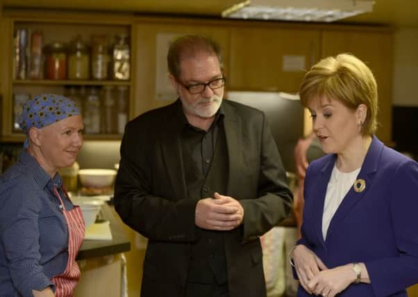 First Minister Nicola Sturgeon at Cyrenians with Ewan Aitken and cookery tutor Sue O'Neill. Picture: Julie Bull