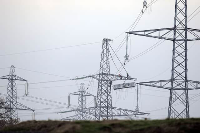 The 13 contracts for its overhead power line networks will support around 400 jobs. Picture: Michael Gillen
