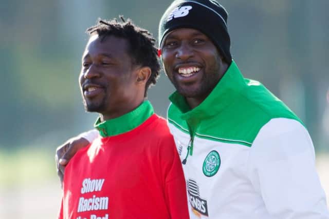 Carlton Cole, picture right with Efe Ambrose, impressed enough while training with Celtic to earn a deal.  Picture: SNS