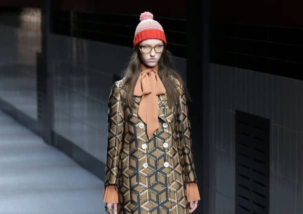 A model wearing a creation for Gucci women's Fall-Winter 2015-2016 collection, part of the Milan Fashion Week/ Pictire: PA