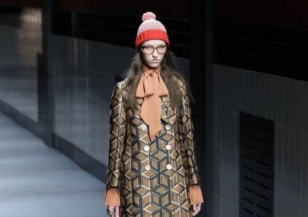 A model wearing a creation for Gucci women's Fall-Winter 2015-2016 collection, part of the Milan Fashion Week/ Pictire: PA