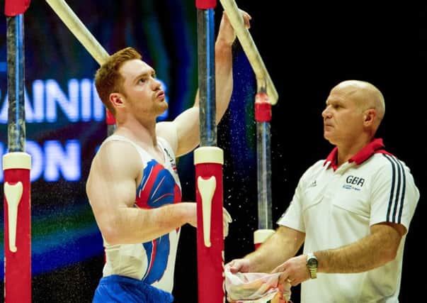 Dan Purvis on the parallel bars during training at the SSE Hydro. Picture: SNS Group