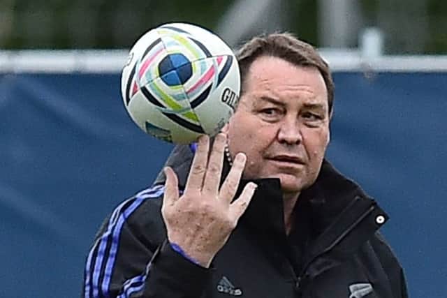 New Zealand' head coach Steve Hansen takes part  in a team training session. Picture: AFP/Getty Images