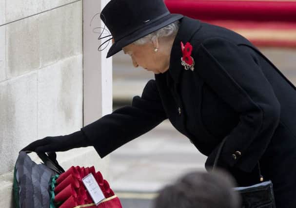 The Queen lays a wreath at the Remembrance Sunday ceremony on Whitehall last year. Picture: Getty