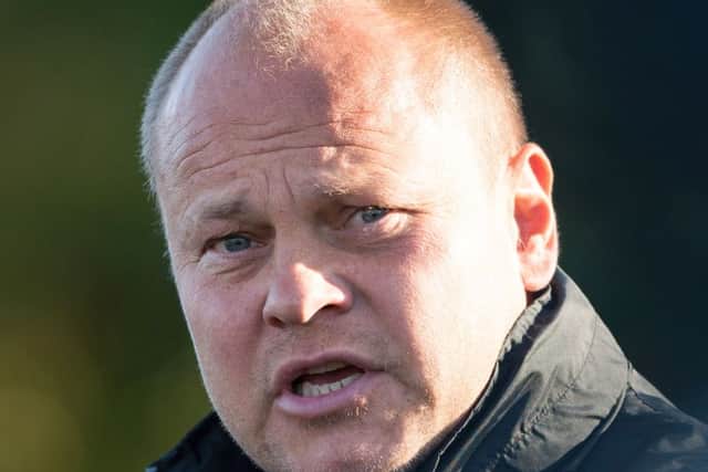 Dundee United manager Mixu Paatelainen watches over training. Picture: SNS