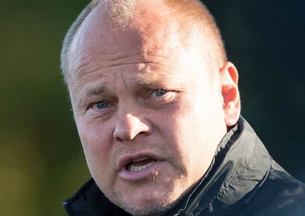 Dundee United manager Mixu Paatelainen watches over training. Picture: SNS