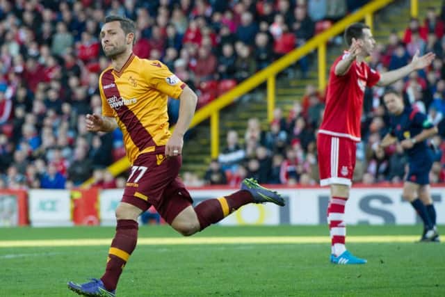 Motherwell star Scott McDonald celebrates his second-half equaliser. Picture: SNS Group