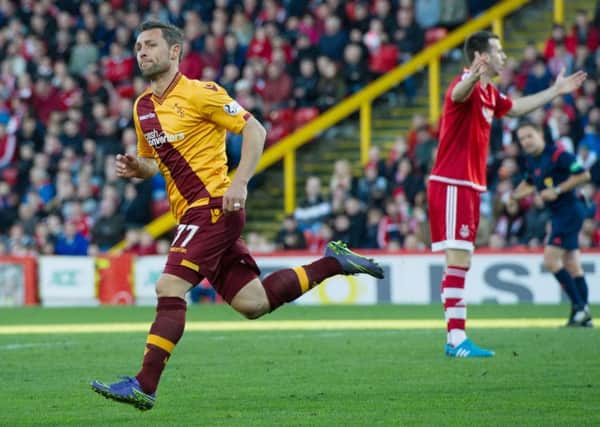 Motherwell star Scott McDonald celebrates his second-half equaliser. Picture: SNS Group
