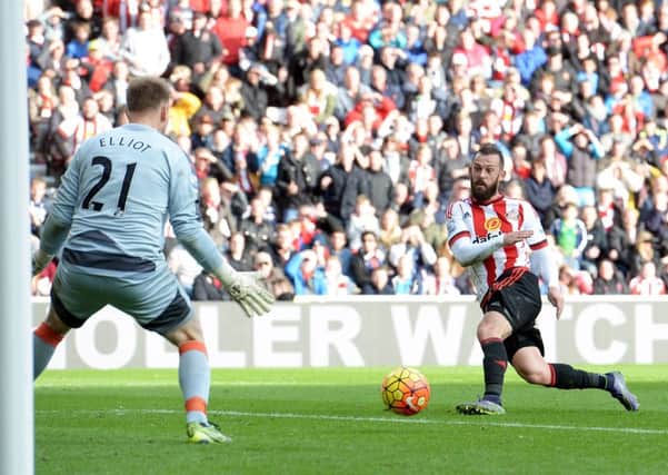 Steven Fletcher scores Sunderlands third goal to make victory certain against Newcastle. Picture: PA