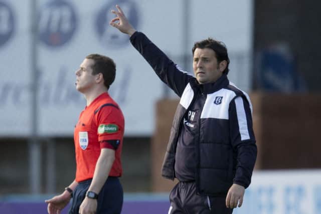Dundee manager Paul Hartley signals the referee during the match against Kilmarnock on Saturday. Picture: SNS Group