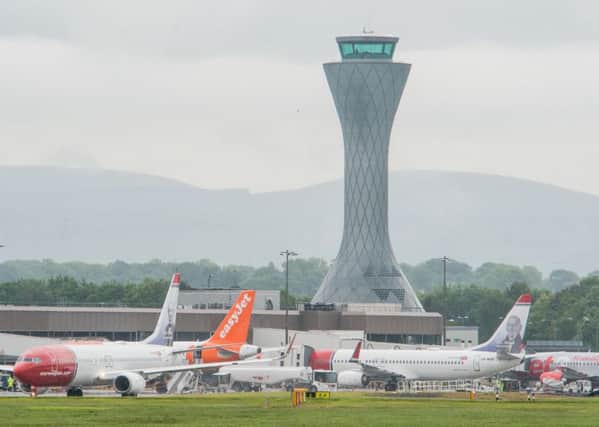 Flights from Edinburgh Airport, Glasgow and Aberdeen have all been delayed due to an air traffic control problem. Picture: Ian Georgeson