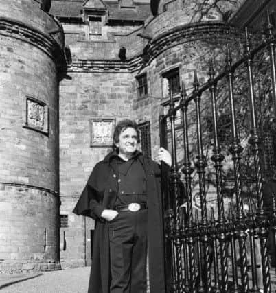 Johnny Cash at the gates of Falkland Palace in 1981. Picture: Stan Warburton