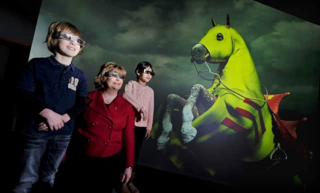 Fiona Hyslop is joined by Maythu Pettigrew and Anthony Pearson  both nine-years-old and from Stirling  at the opening of the Battle of Bannockburn Visitor Centre last year. Picture: Donald Macleod