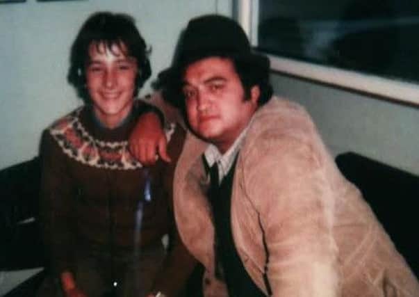 Colin Bruce, aged 15, with John Belushi at Wick Airport and wearing the Walkman gifted by the star