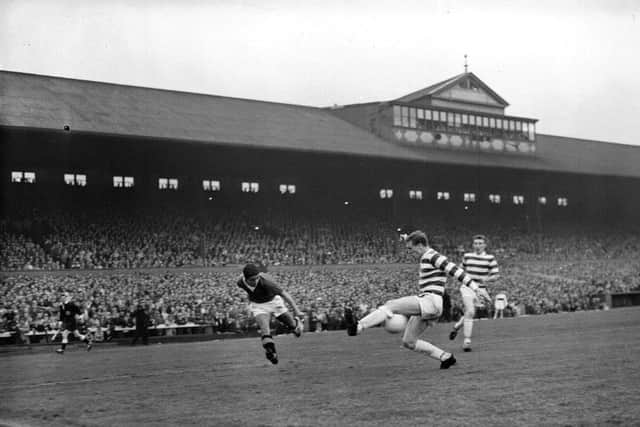 The old Celtic Park main stand is packed for an Old Firm match in August 1963. Picture: TSPL