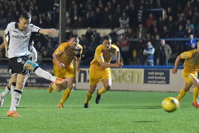 Steven MacLean scores from the penalty spot to draw St Johnstone level at 1-1 against Morton at Cappielow last night. Picture: SNS Group