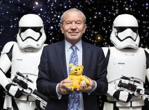 Lord Sugar with two stormtroopers as BBC Children In Need will join forces with Lucasfilm and Disney for a star-studded Star Wars-inspired special. Picture: PA/BBC